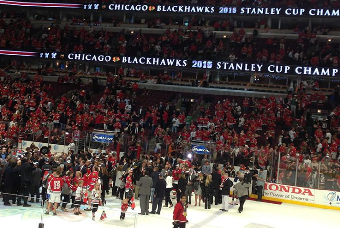Members of the Chicago Blackhawks organization celebrate on ice following clinching the 2015 Stanley Cup at the United Center in Chicago