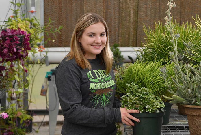KCC-student Jenna Bennett int he KCC Greenhouse-02